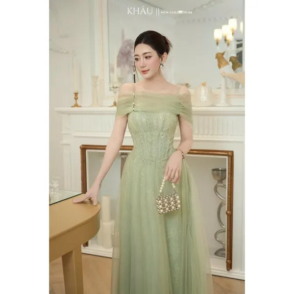 Pass đầm dạ hội trễ vai dáng dài xếp ly màu xanh bơ - Khâu